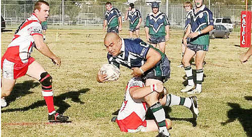 Killarney Cutters footballer Brett Watts tackles Stanthorpe Gremlins prop Leon Karena at Charlie Andrews Oval. Killarney Cutters footballer Brett Watts tackles Stanthorpe Gremlins prop Leon Karena at Charlie Andrews Oval.